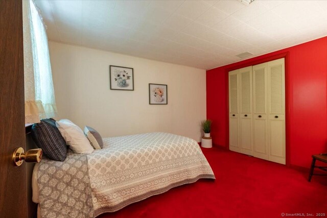 169 Wheeling Rd, Andover, CT 06232 - bedroom with carpet and a closet