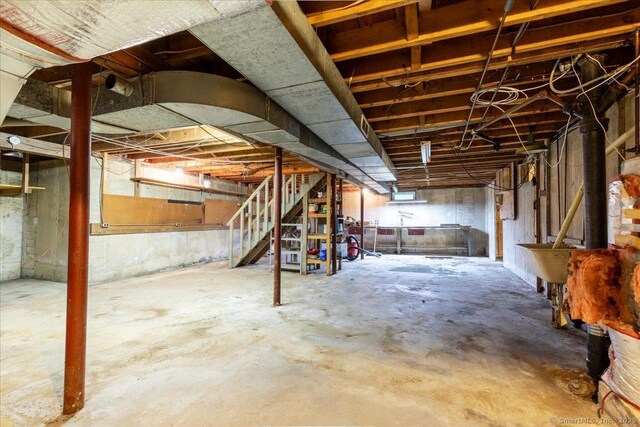169 Wheeling Rd, Andover, CT 06232 - unfinished basement featuring stairway