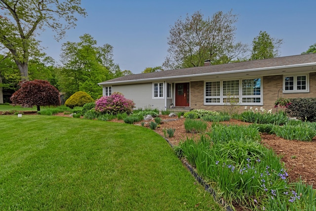 4 Melburn Ave, East Hampton, CT 06424 - single story home with a front yard and a chimney