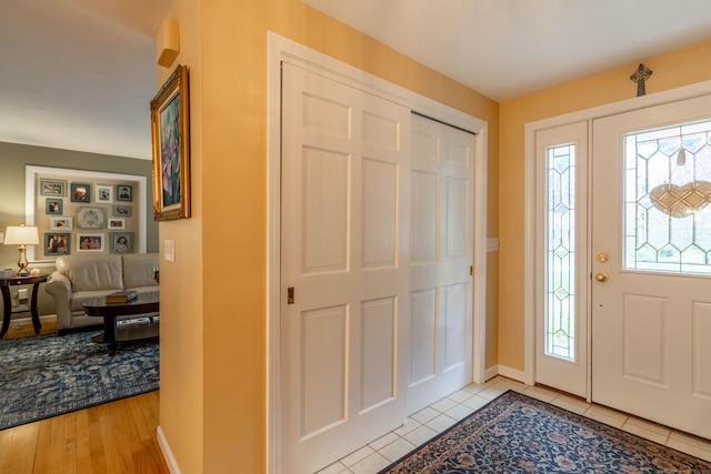 4 Melburn Ave, East Hampton, CT 06424 - foyer with baseboards and light tile patterned flooring
