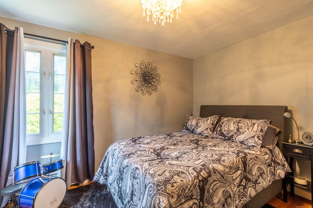4 Melburn Ave, East Hampton, CT 06424 - bedroom featuring a chandelier