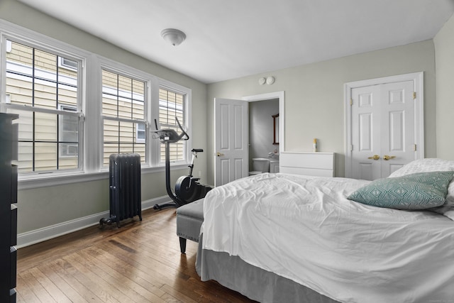 1492 Dixwell Ave, Hamden, CT 06514 - bedroom featuring radiator heating unit and hardwood / wood-style flooring