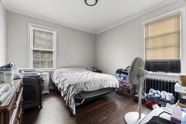 1492 Dixwell Ave, Hamden, CT 06514 - bedroom with dark wood-style floors, crown molding, radiator, and cooling unit
