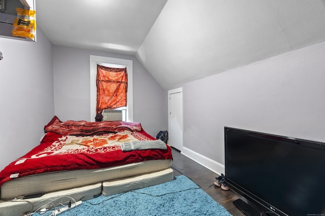 1492 Dixwell Ave, Hamden, CT 06514 - bedroom featuring cooling unit, vaulted ceiling, and dark wood finished floors