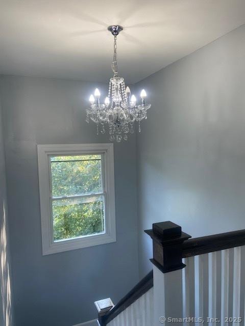 524 Broad St, Bristol, CT 06010 - stairway with a chandelier and baseboards