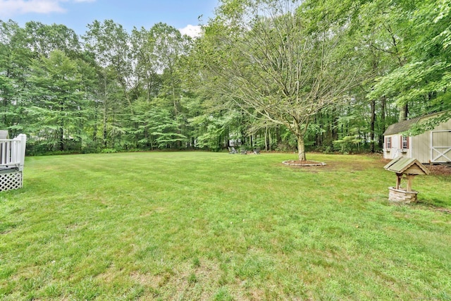 190 Charles St, Tolland, CT 06084 - view of green lawn featuring a storage shed