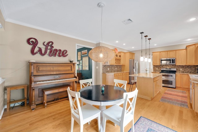 190 Charles St, Tolland, CT 06084 - dining room with crown molding, light wood-style floors, and recessed lighting