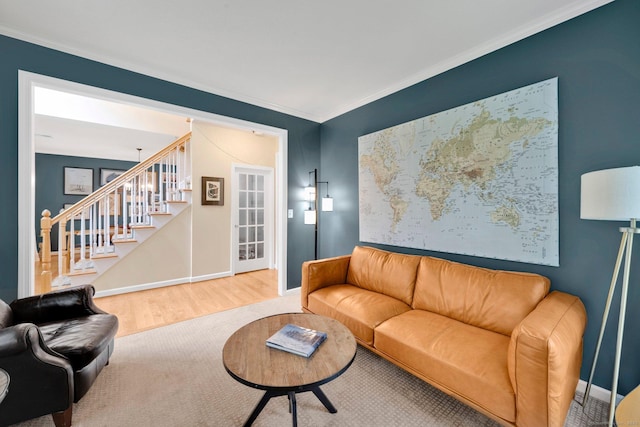 190 Charles St, Tolland, CT 06084 - living room with wood finished floors, stairs, and ornamental molding