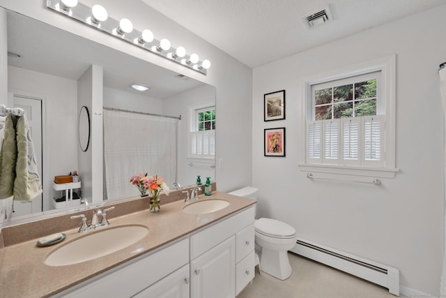 190 Charles St, Tolland, CT 06084 - full bathroom featuring baseboard heating, double vanity, and curtained shower