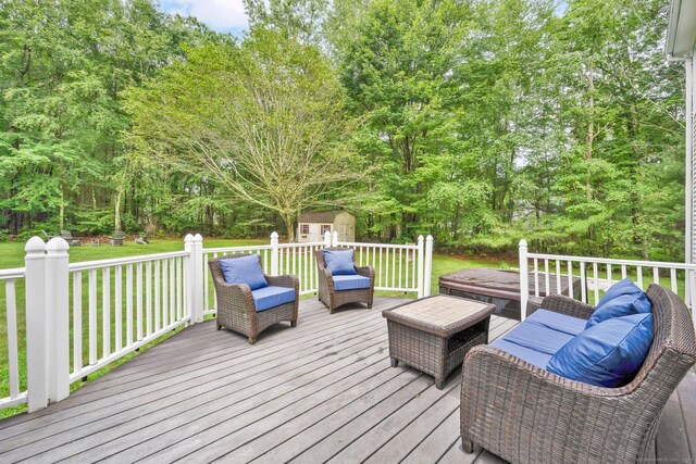 190 Charles St, Tolland, CT 06084 - wooden deck with a storage unit and a lawn