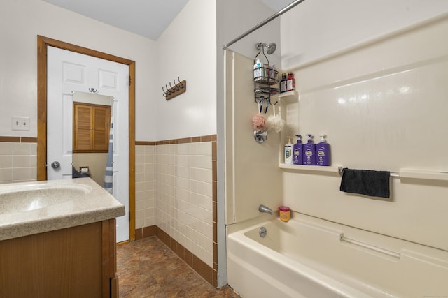 107 May St, West Haven, CT 06516 - bathroom featuring tile walls, vanity,  shower combination, and wainscoting