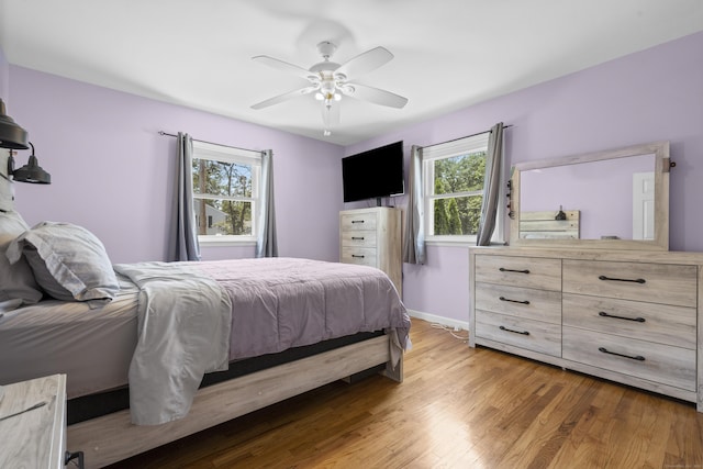 107 May St, West Haven, CT 06516 - bedroom with multiple windows, wood finished floors, and ceiling fan