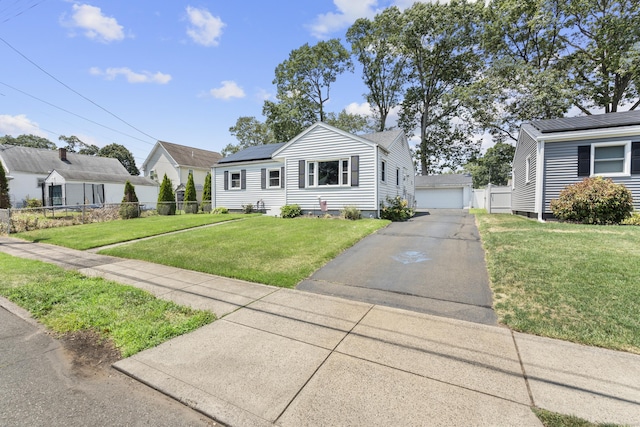 107 May St, West Haven, CT 06516 - view of front of property featuring a garage and an outbuilding
