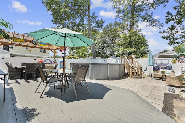 107 May St, West Haven, CT 06516 - deck with outdoor dining area, a fenced backyard, outdoor lounge area, and stairs