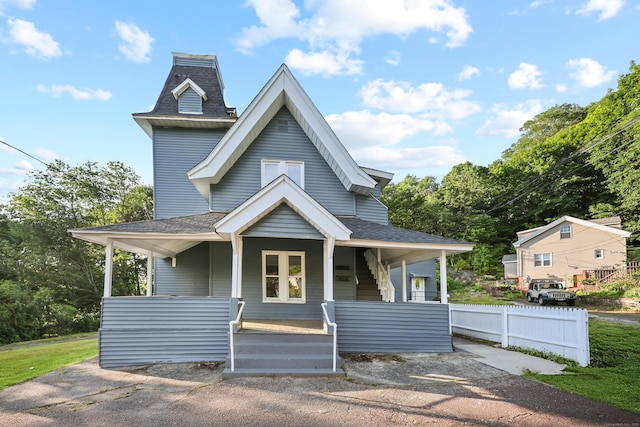 122 Oak St, Naugatuck, CT 06770 - view of front of home featuring covered porch and a shingled roof