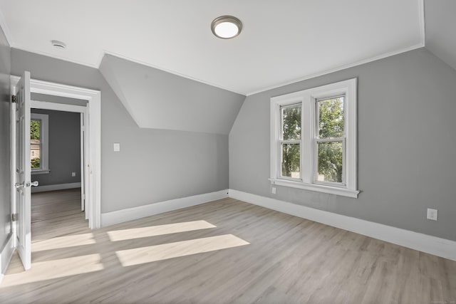 122 Oak St, Naugatuck, CT 06770 - bonus room featuring vaulted ceiling, plenty of natural light, and wood finished floors