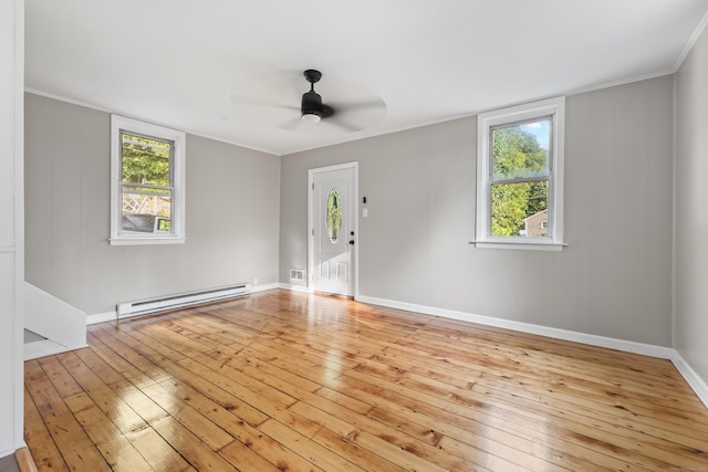 122 Oak St, Naugatuck, CT 06770 - spare room with baseboard heating, wood-type flooring, and ceiling fan