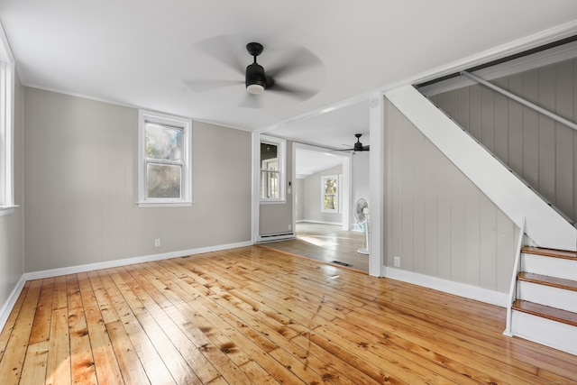122 Oak St, Naugatuck, CT 06770 - empty room with hardwood / wood-style flooring, a ceiling fan, and stairs