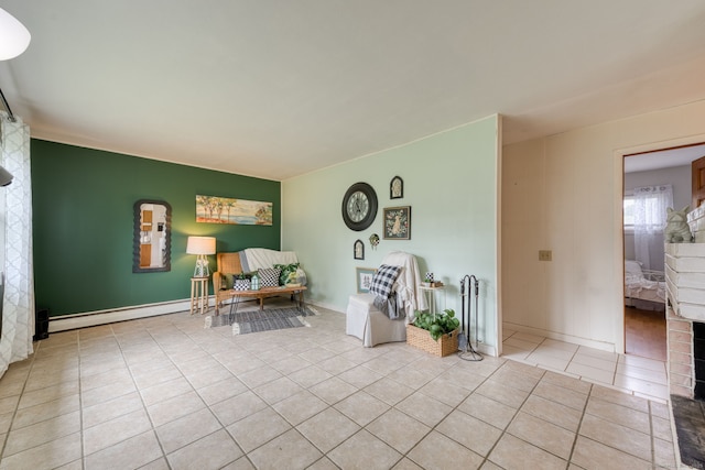 55 Taylor Rd, East Hartford, CT 06110 - living area featuring tile patterned floors, a baseboard radiator, and an accent wall