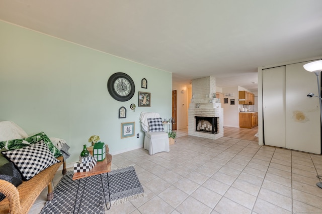 55 Taylor Rd, East Hartford, CT 06110 - living area with light tile patterned floors and a brick fireplace