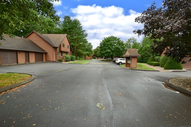 105 Maple Ave Apt 16, Vernon, CT 06066 - view of asphalt road featuring curbs
