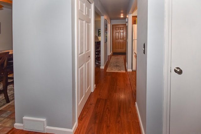 105 Maple Ave Apt 16, Vernon, CT 06066 - hallway featuring dark wood-style flooring and baseboards