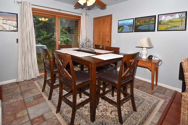 105 Maple Ave Apt 16, Vernon, CT 06066 - dining room with ceiling fan and stone finish flooring