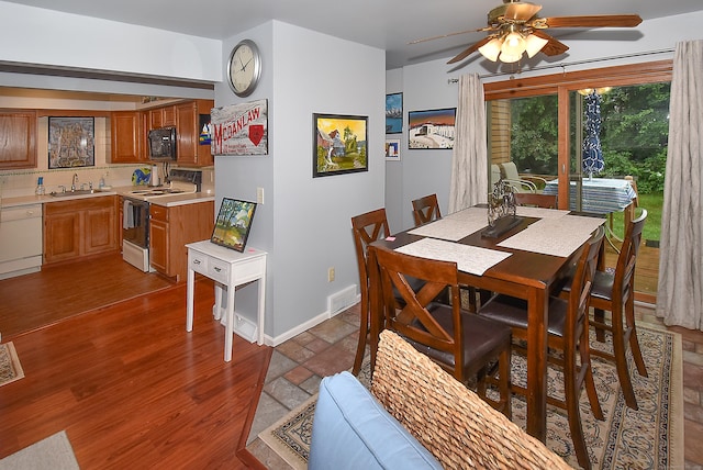 105 Maple Ave Apt 16, Vernon, CT 06066 - dining area with a ceiling fan and wood finished floors