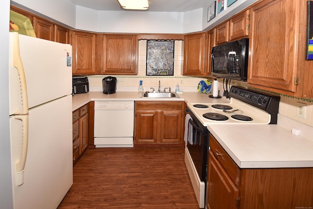 105 Maple Ave Apt 16, Vernon, CT 06066 - kitchen featuring white appliances, brown cabinetry, light countertops, and dark wood-style flooring