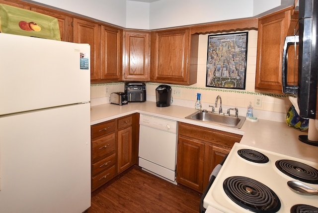 105 Maple Ave Apt 16, Vernon, CT 06066 - kitchen featuring white appliances, light countertops, and brown cabinetry