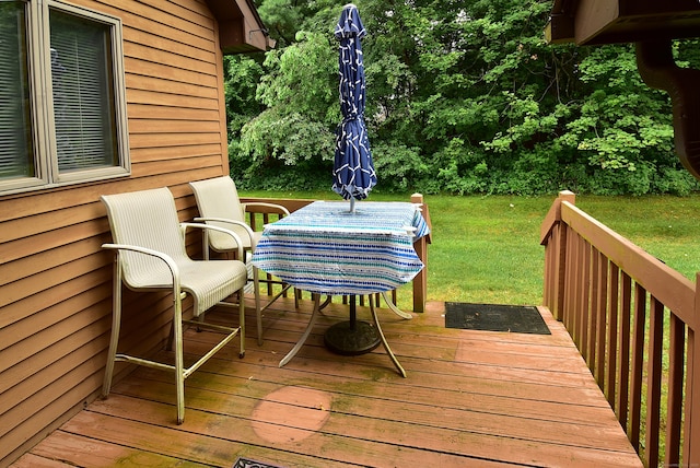 105 Maple Ave Apt 16, Vernon, CT 06066 - wooden deck featuring a yard and outdoor dining area
