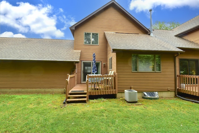 105 Maple Ave Apt 16, Vernon, CT 06066 - back of property with a wooden deck, roof with shingles, and a yard