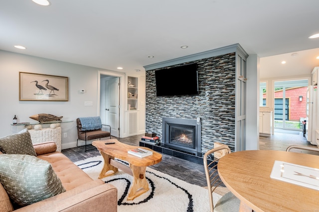 114 Lakeside Dr, East Haddam, CT 06423 - living area featuring recessed lighting, a fireplace, light wood finished floors, and built in shelves