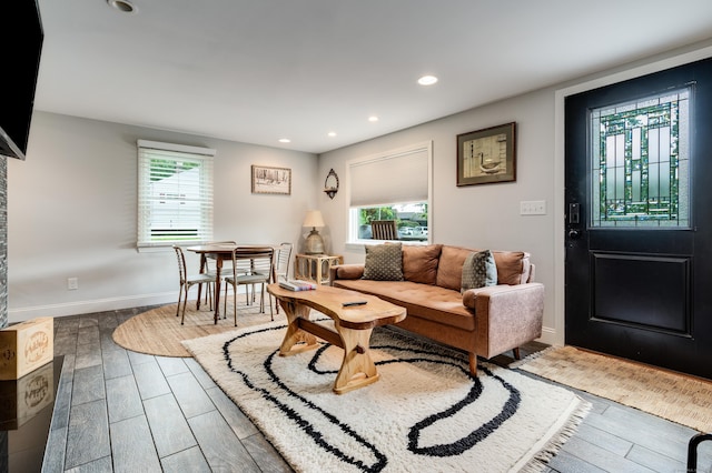114 Lakeside Dr, East Haddam, CT 06423 - living area with plenty of natural light, wood finished floors, and recessed lighting