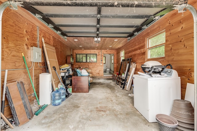 114 Lakeside Dr, East Haddam, CT 06423 - garage featuring washer / clothes dryer and wooden walls