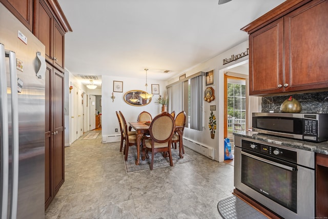 87 Kaynor Dr, Waterbury, CT 06708 - kitchen featuring stainless steel appliances, a baseboard heating unit, decorative backsplash, decorative light fixtures, and brown cabinetry