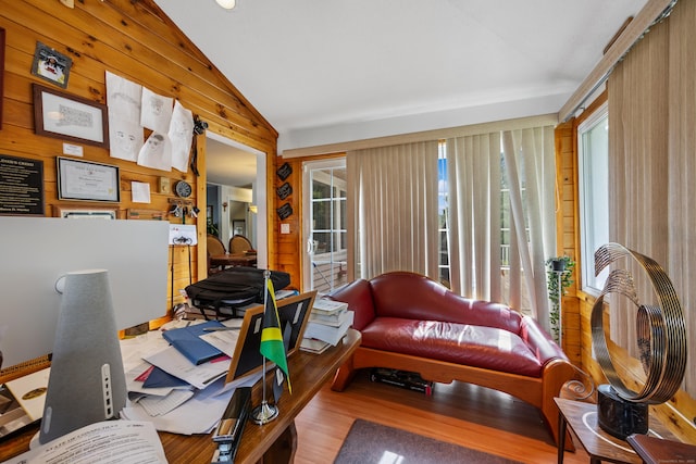 87 Kaynor Dr, Waterbury, CT 06708 - home office featuring lofted ceiling, wooden walls, and wood finished floors