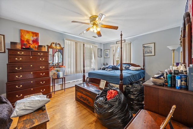 87 Kaynor Dr, Waterbury, CT 06708 - bedroom featuring a baseboard heating unit, light wood-style flooring, and a ceiling fan