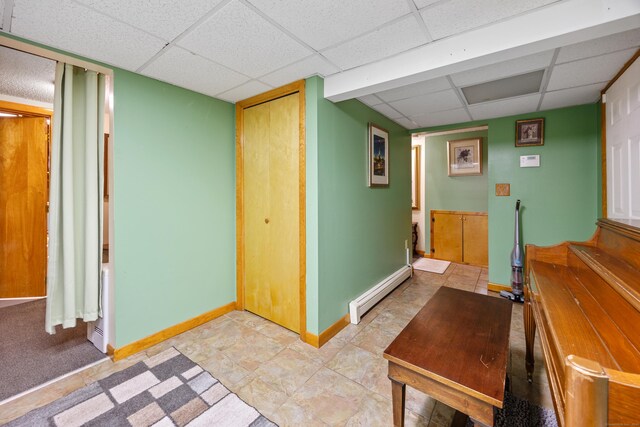 87 Kaynor Dr, Waterbury, CT 06708 - interior space with a baseboard heating unit and a paneled ceiling