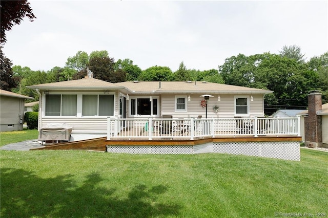 87 Kaynor Dr, Waterbury, CT 06708 - rear view of house featuring a deck and a lawn