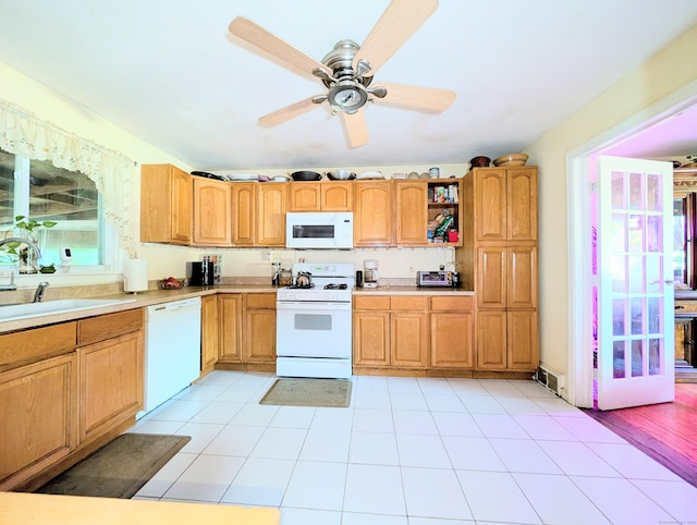 943 Success Ave, Stratford, CT 06614 - kitchen with white appliances, ceiling fan, light countertops, and open shelves