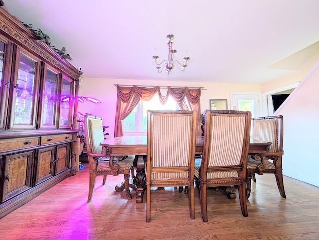943 Success Ave, Stratford, CT 06614 - dining area with plenty of natural light, a chandelier, and wood finished floors