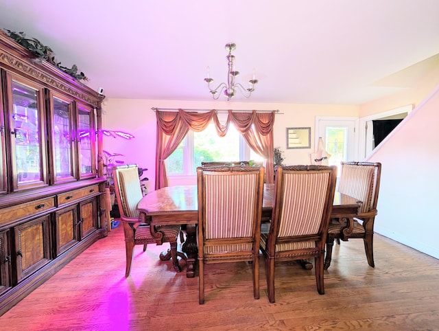 943 Success Ave, Stratford, CT 06614 - dining room with a chandelier and wood finished floors