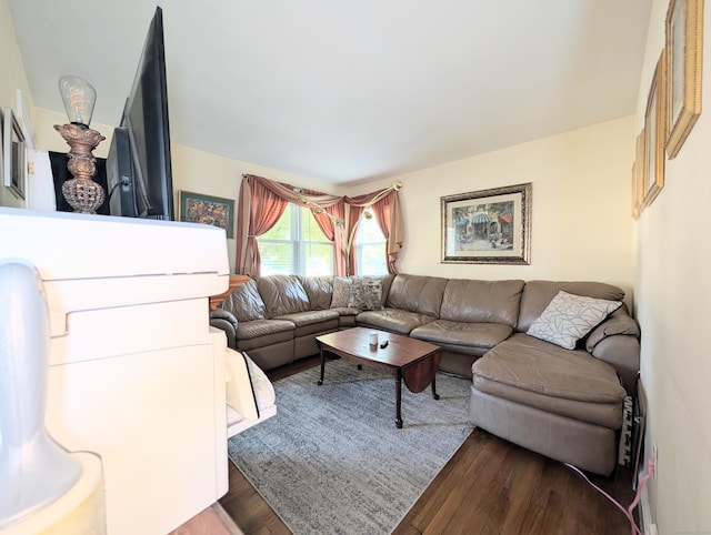 943 Success Ave, Stratford, CT 06614 - living area with dark wood-style flooring