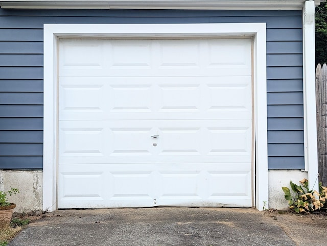 943 Success Ave, Stratford, CT 06614 - garage with asphalt driveway