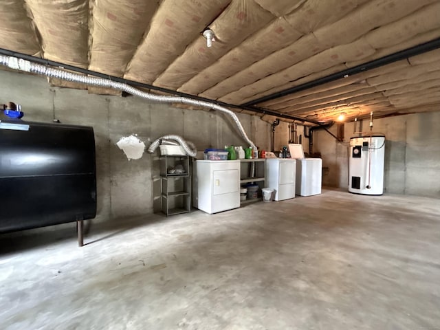2 Wentworth Dr, Milford, CT 06460 - basement featuring water heater, oil tank, and washing machine and clothes dryer