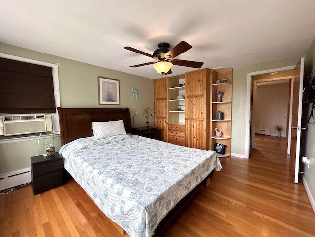 2 Wentworth Dr, Milford, CT 06460 - bedroom with cooling unit, wood finished floors, and a baseboard heating unit