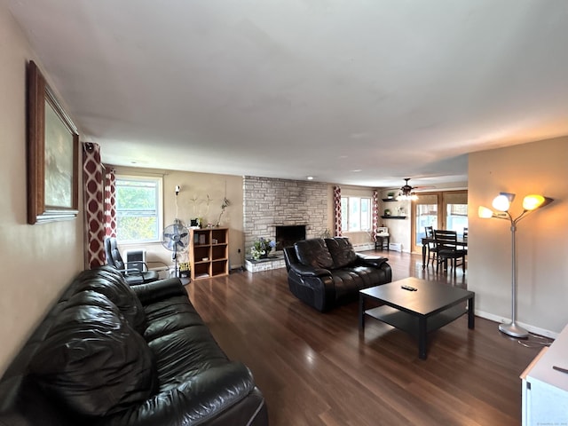 2 Wentworth Dr, Milford, CT 06460 - living room featuring dark wood-style floors, plenty of natural light, a fireplace, and a ceiling fan