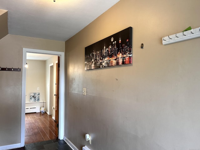 2 Wentworth Dr, Milford, CT 06460 - hall with a baseboard heating unit and dark wood-type flooring