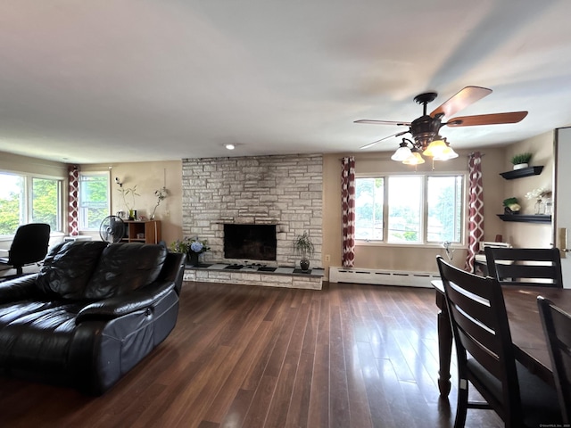 2 Wentworth Dr, Milford, CT 06460 - living area featuring a baseboard radiator, healthy amount of natural light, dark wood finished floors, and ceiling fan